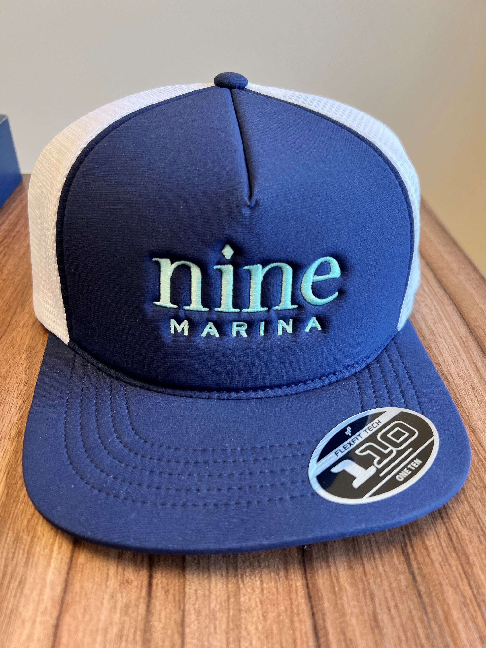 FOAM 110 FLATBILL NAVY HAT W/ TURQ NINE STACKED