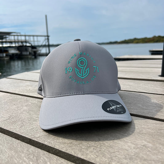 DELTA HAT SILV/TURQ CIRCLE LOGO